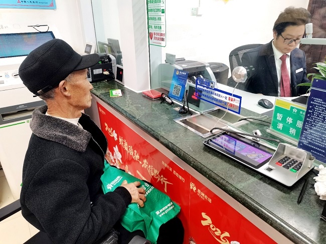 一个绿色布袋的温暖约定